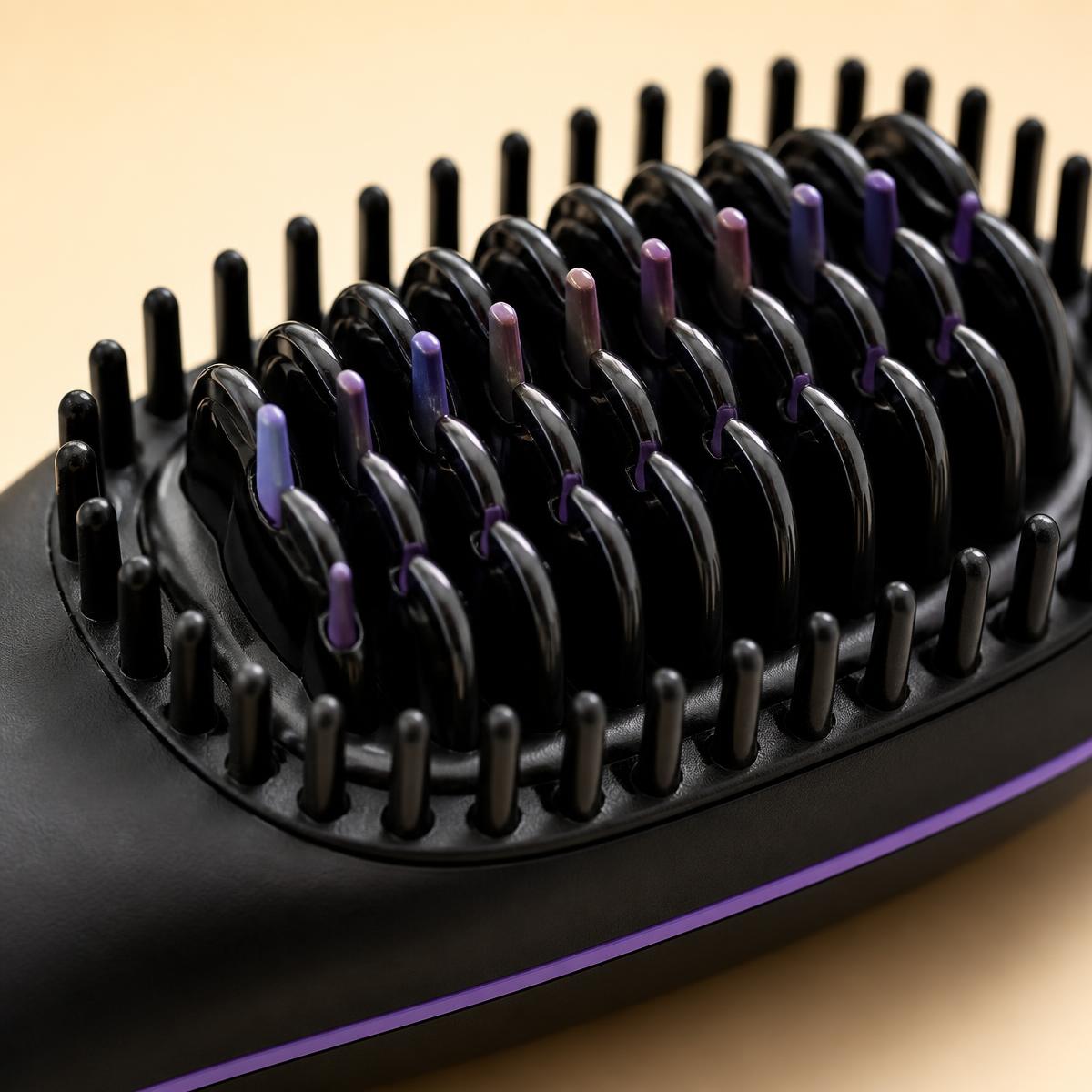 Close-up of the heated comb teeth and anti-scald outer ring